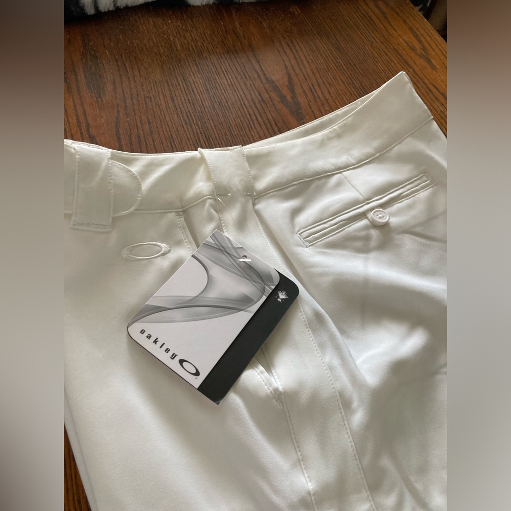 Oakley white crop pants. Dress up or down for work or play. Size 12- slim fit.